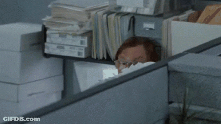 Office Space Milton Hiding With Phone On GIF