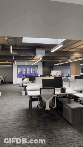 Office With Sign Saying Proud GIF