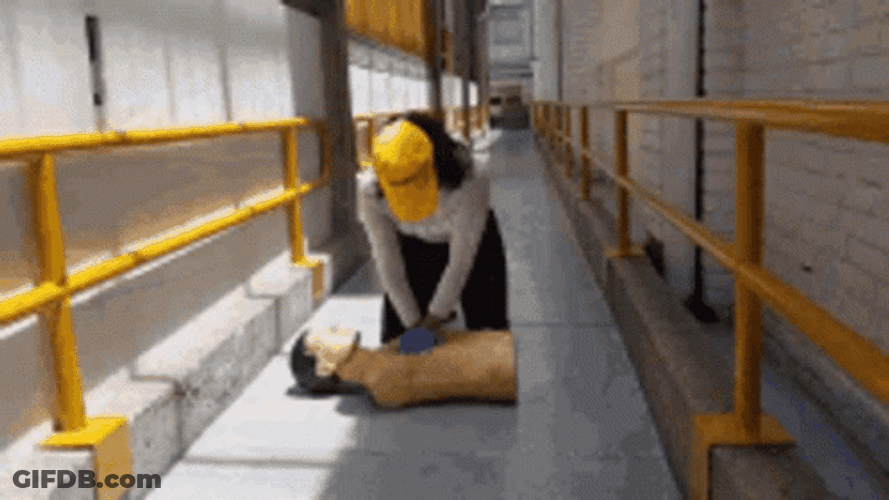 Officer Doing Cpr On Dummy GIF