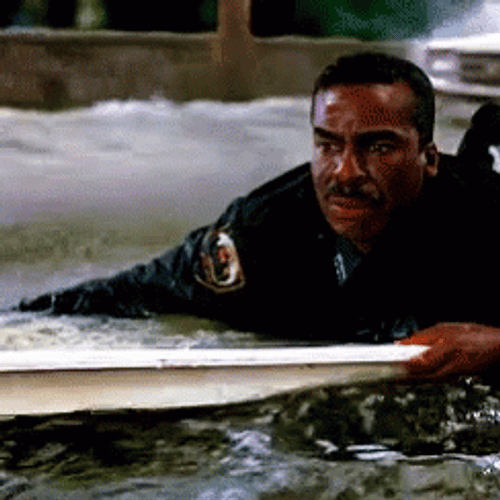 Officer Frightened Of The Flooding GIF