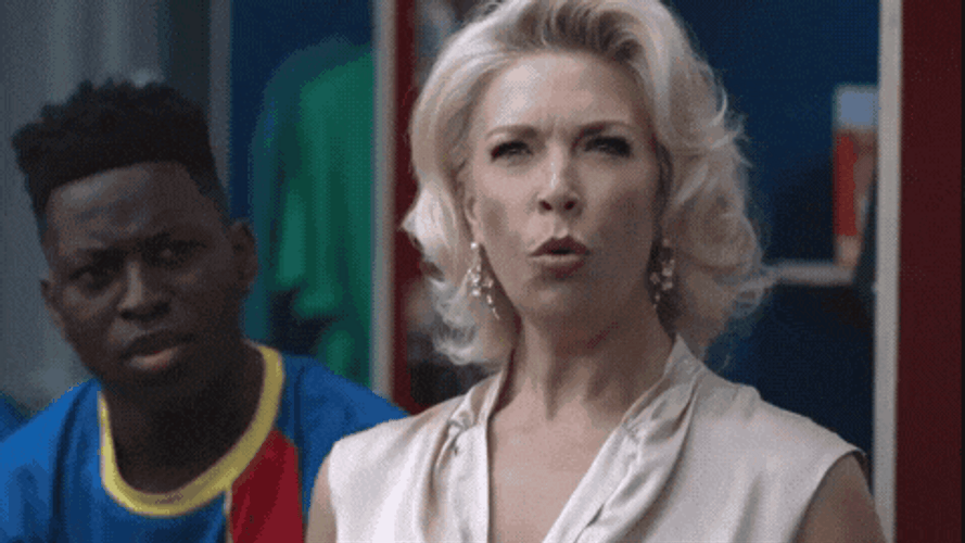 Ohhh Rebecca Welton And Guy Behind Her GIF