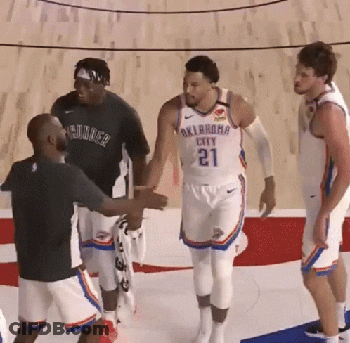Oklahoma City Thunder Player Number 21 Shakes Hands With A Man GIF