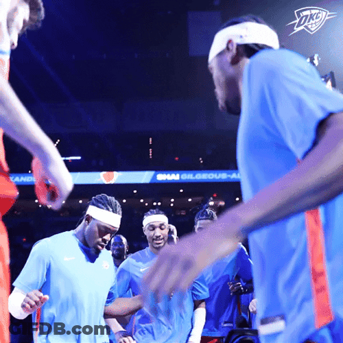 Oklahoma City Thunder Players Warming Up Excitedly GIF
