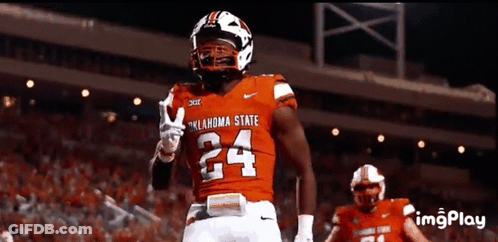 Oklahoma State Football Player Giving Peace Sign GIF