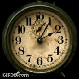 Old Alarm Clock Showing Almost Eleven GIF