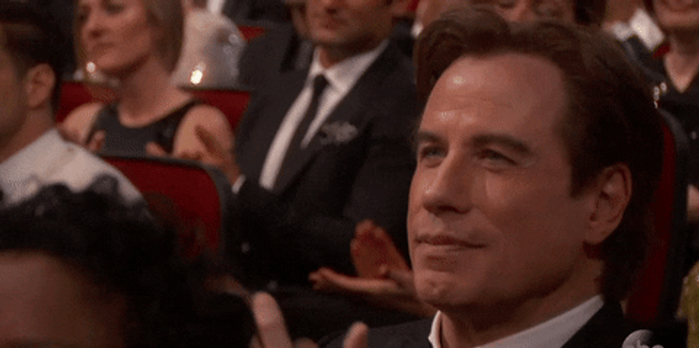 Old John Travolta Smiling GIF