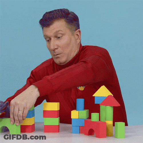 Old Man Building Lego GIF