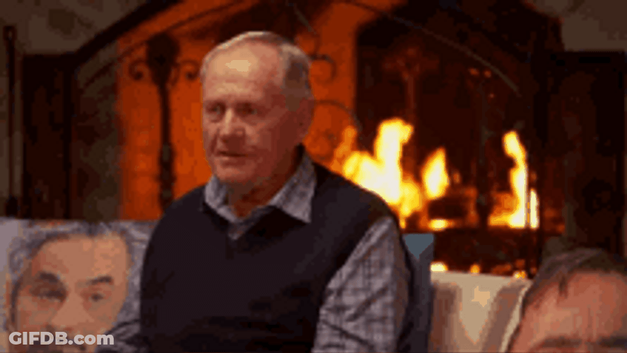 Old Man Near Fireplace Gun To Head GIF
