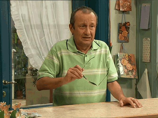 Old Man Putting Shades GIF