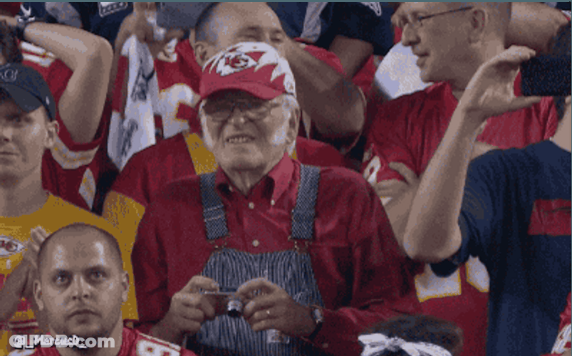 Old Man Watching Game Using Binoculars GIF
