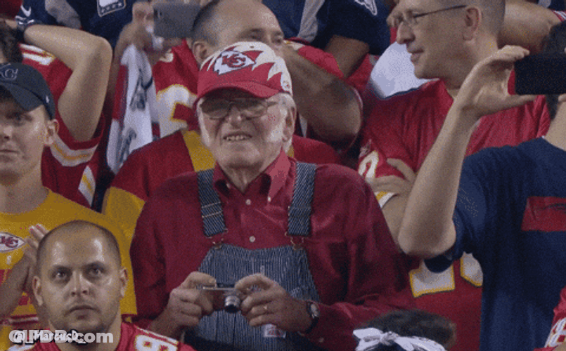 Old Sports Fan Taking Picture During Game GIF
