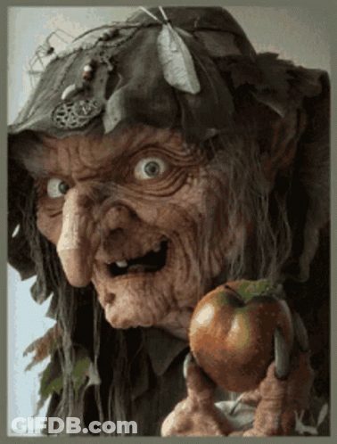 Old Witch Holding Apple With Pentagram On Head GIF