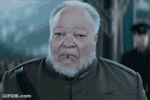 Older Bearded Man In Military Uniform With Cross GIF