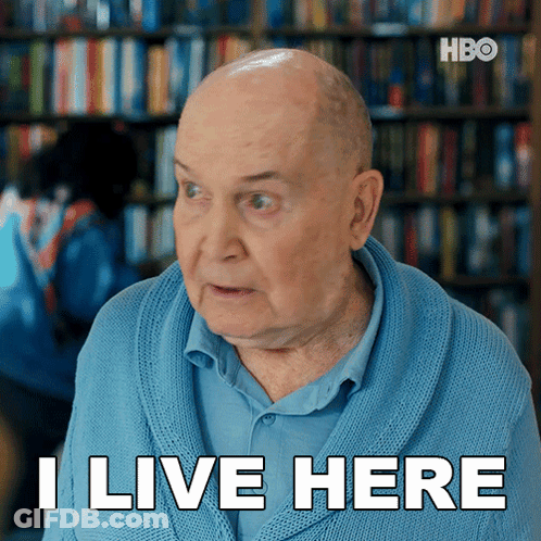 Older Man In Blue Sweater Says I Live Here GIF