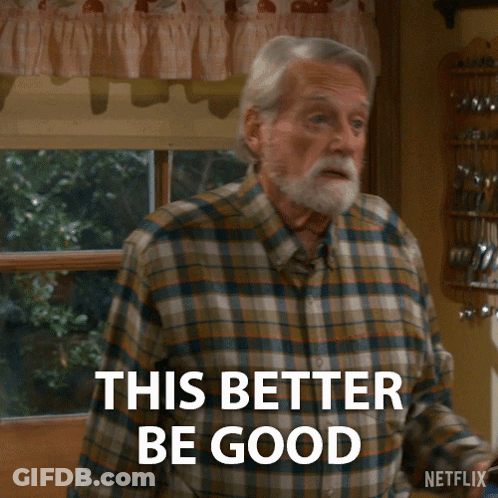 Older Man In Plaid Shirt Holding Beer Saying This Better Be Good GIF