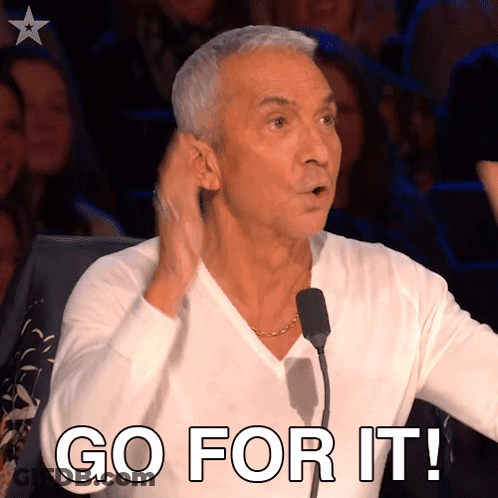 Older Man Speaking Into Microphone Saying Go For It GIF