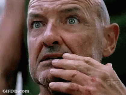 Older Man With Beard Covering Mouth GIF