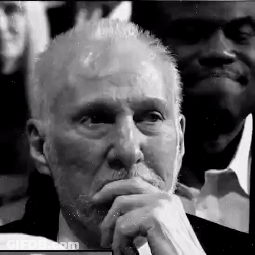 Older Man With Beard In Crowd GIF