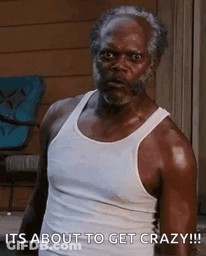 Older Man With Beard In White Tank Top Making Funny Face GIF