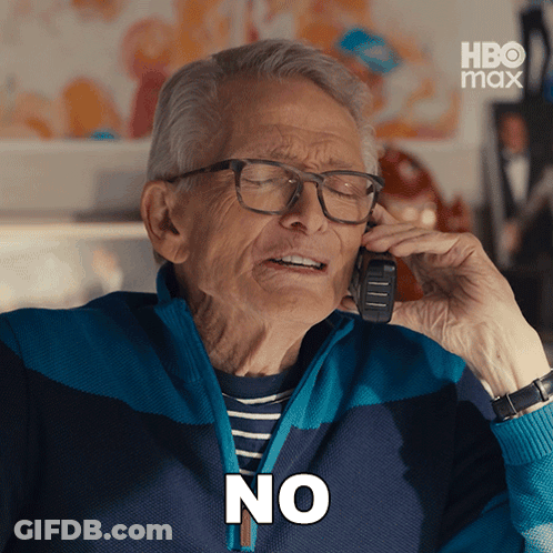 Older Man With Glasses Talking On Phone Saying No GIF
