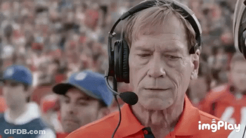 Older Man With Headphones And Microphone Watching Football GIF
