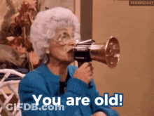 Older Woman Holding Megaphone GIF