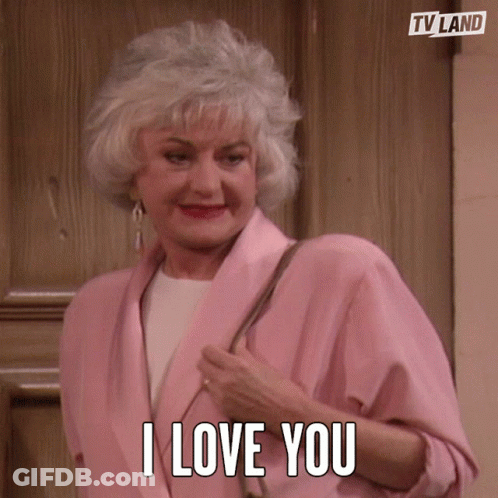 Older Woman In Pink Jacket Says I Love You GIF