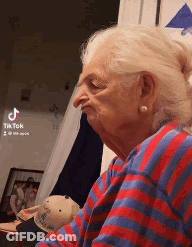 Older Woman In Red And Blue Striped Shirt TikTok Account Lilihayes GIF