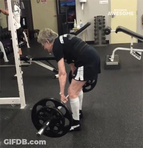 Older Woman Lifting Barbell Saying Awesome GIF