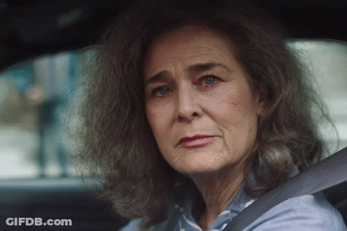 Older Woman With Gray Hair Sitting In Car GIF