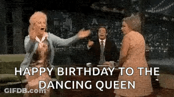 Older Women And Man In Suit At Table GIF