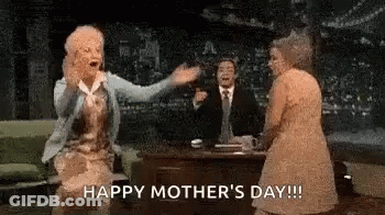 Older Women And Man In Suit At Table GIF