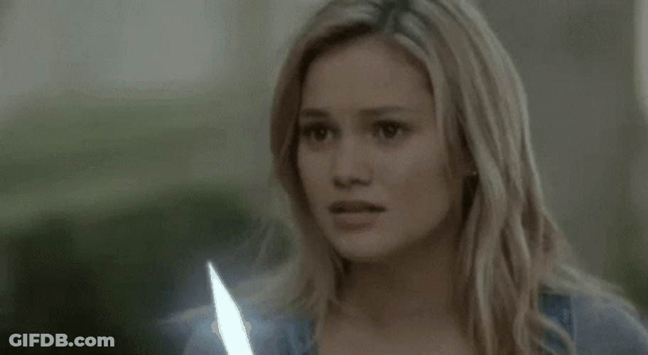 Olivia Holt Holding Dagger GIF