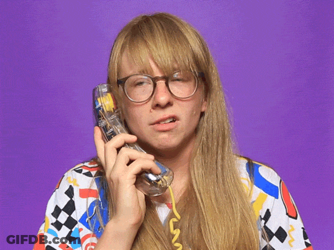 On Hold Woman Shaking Her Head GIF