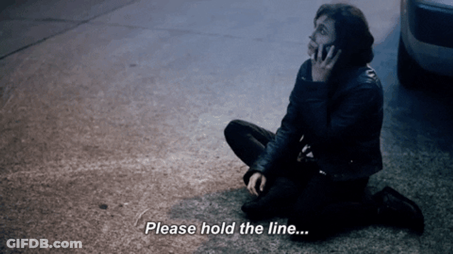 On Hold Woman Sitting On The Road GIF