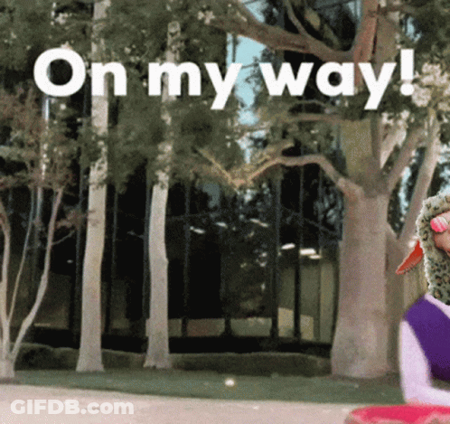 On My Way Sign In Front Of Tree GIF