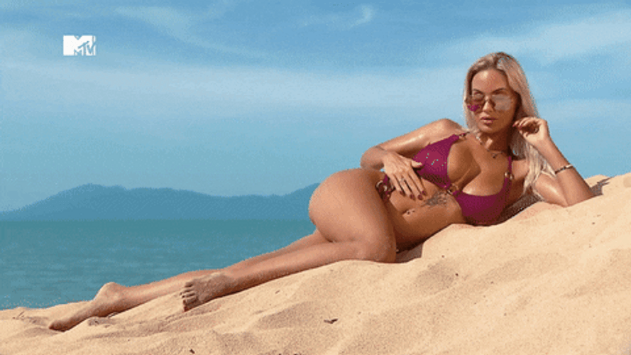 On The Beach Wearing Sexy Bikini GIF