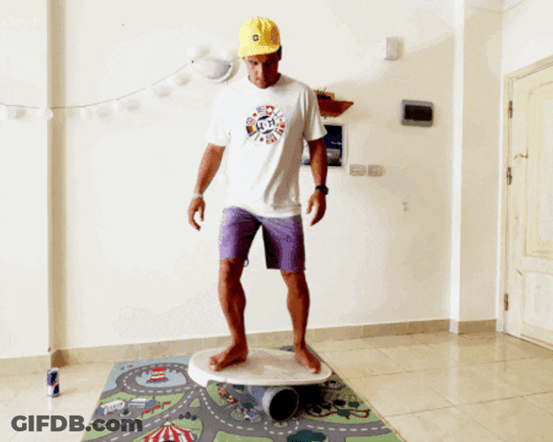 One Foot Paddle Boarding On Balance Beam GIF