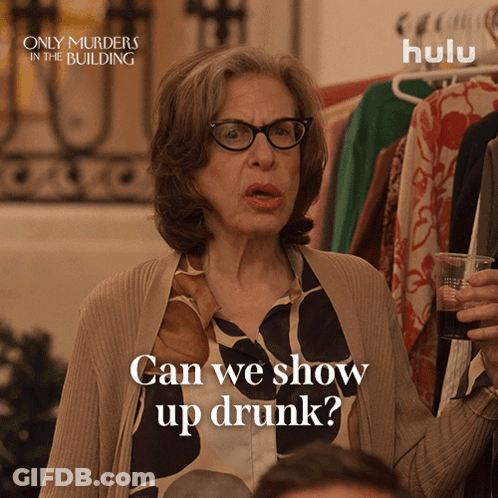 Only Murders In The Building Ad Woman Holding Glass GIF
