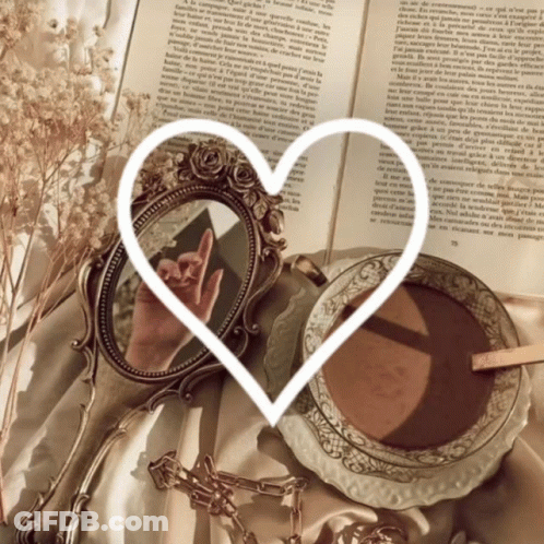 Open Book To Page 75 With Heart GIF