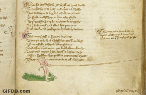 Open Book With Man Laying On Grass GIF