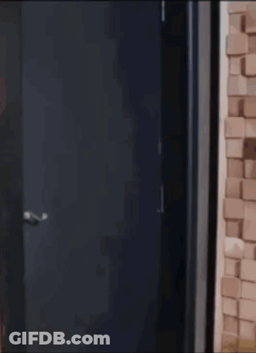 Open Door To Brick Wall GIF