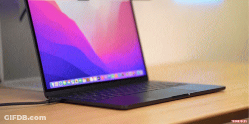 Open Laptop On Wooden Desk Saying Thinkpads GIF