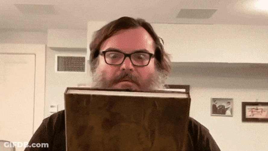 Opening Book That Shines Like Gold GIF