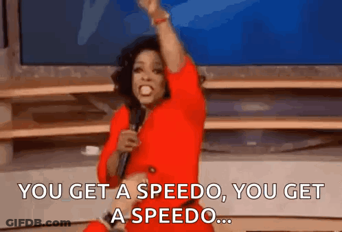 Oprah Winfrey Is Holding A Microphone And Saying You Get A Speedo You Get A Speedo . GIF