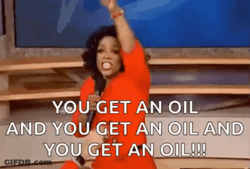 Oprah Winfrey Is Holding A Microphone And Saying `` You Get An Oil And You Get An Oil And You Get An Oil . '' GIF