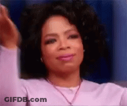 Oprah Winfrey Making Funny Face In Purple Sweater GIF