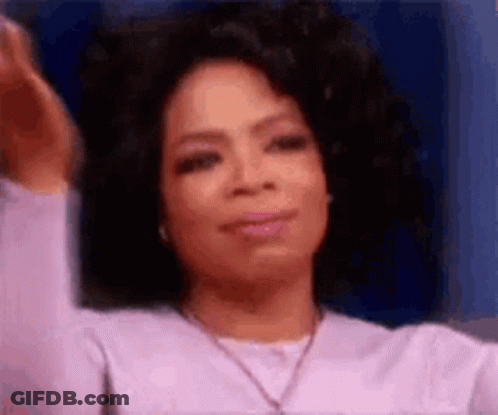 Oprah Winfrey Smiling And Making Funny Face GIF