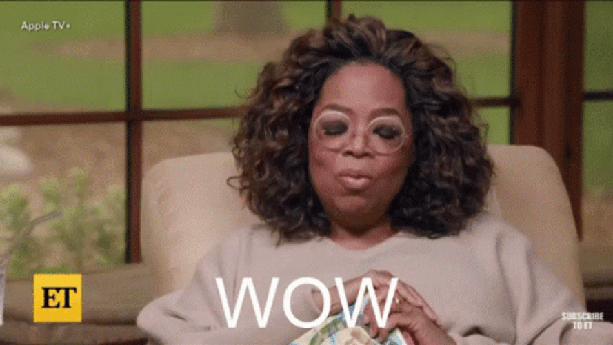 Oprah Winfrey Wow Impressed Glasses Flash Meme GIF