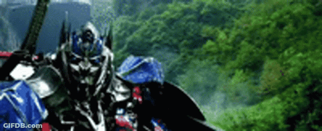 Optimus Prime Dodging Enemy Attack GIF